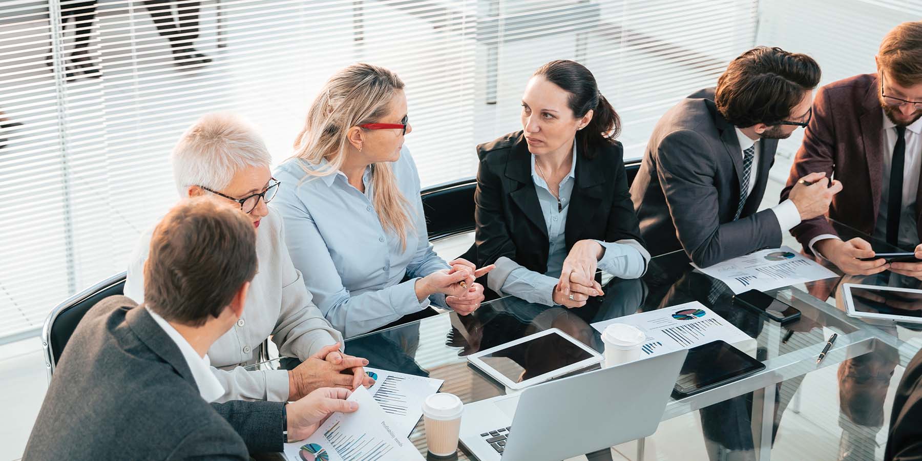 Business meeting with people talking among themselves