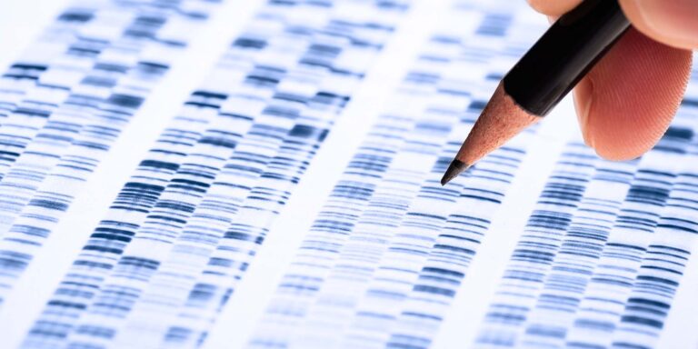 a pencil pointing at gene readings