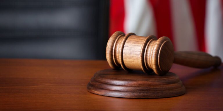 A judges courtroom gavel on desk