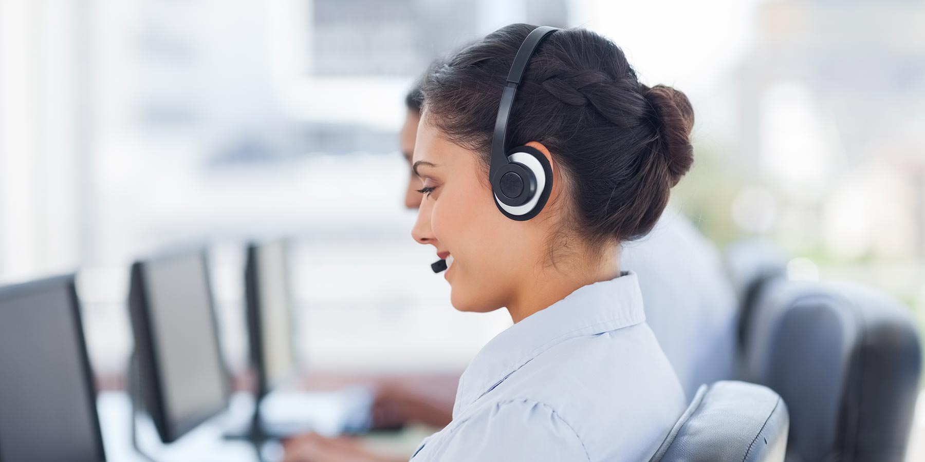 Photo of someone talking on a headset