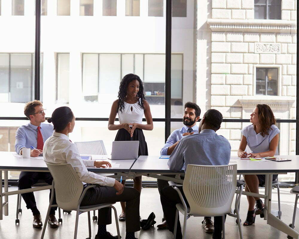 employees meeting at table