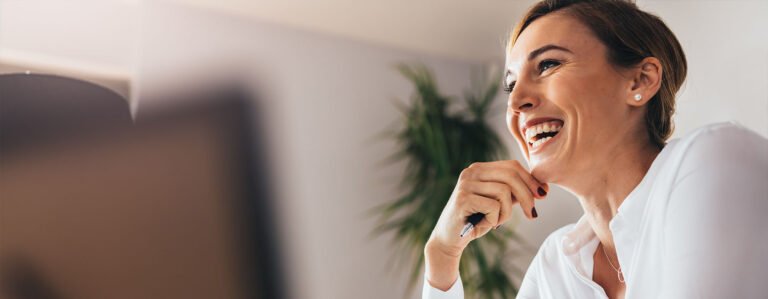 Happy formally dress lady smiling at people