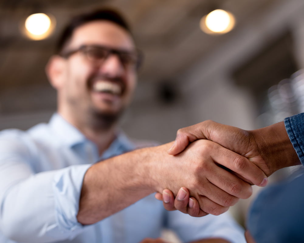 Two people shaking hands