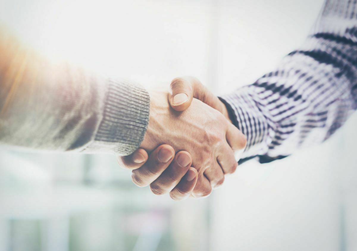 two business people shaking hands