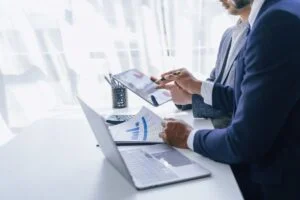 Two business people reviewing data